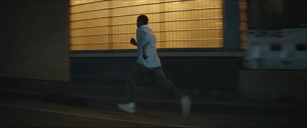 A man runs at night in Highest 2 Lowest.