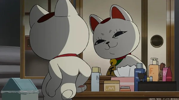 A cat looks at itself in the mirror in "Dandadan".