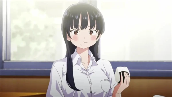 A girl with long dark hair eating a rice ball in "The Dangers in My Heart".